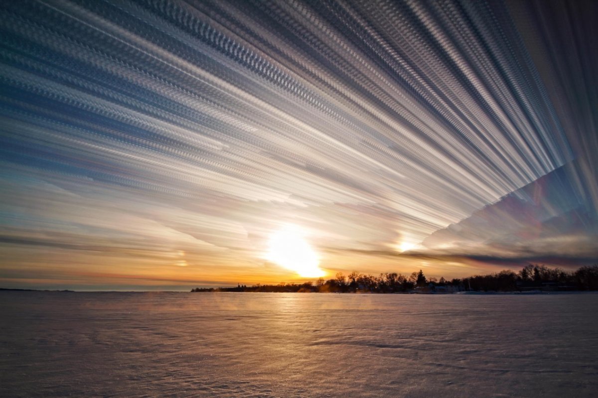 Лучи солнца сквозь облака