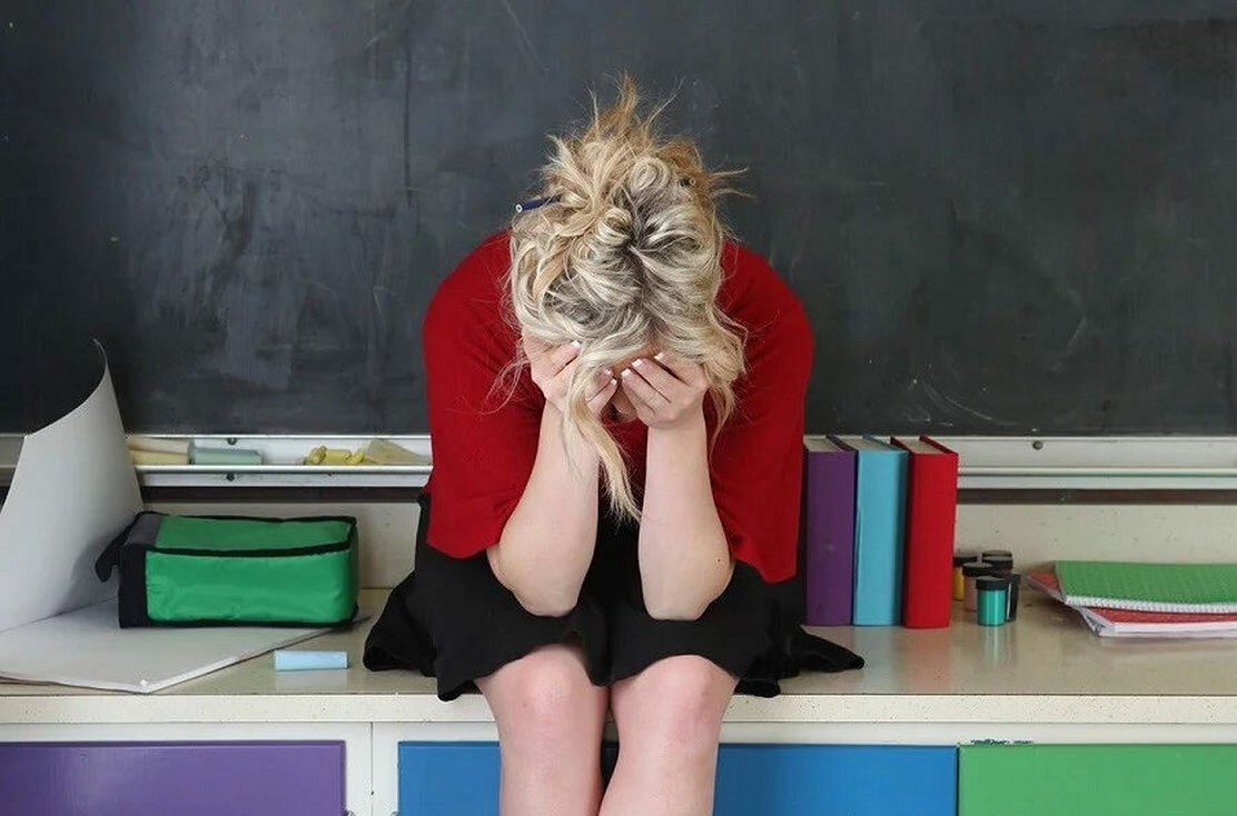 Грустный учитель