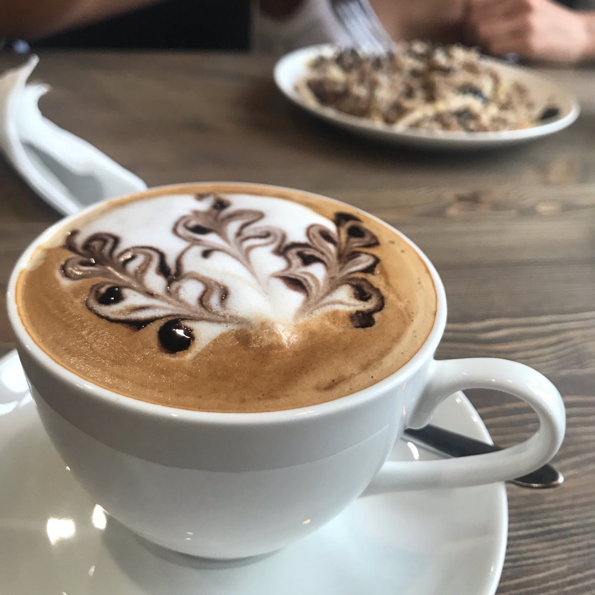 Вкусный кофе в красивой чашечке