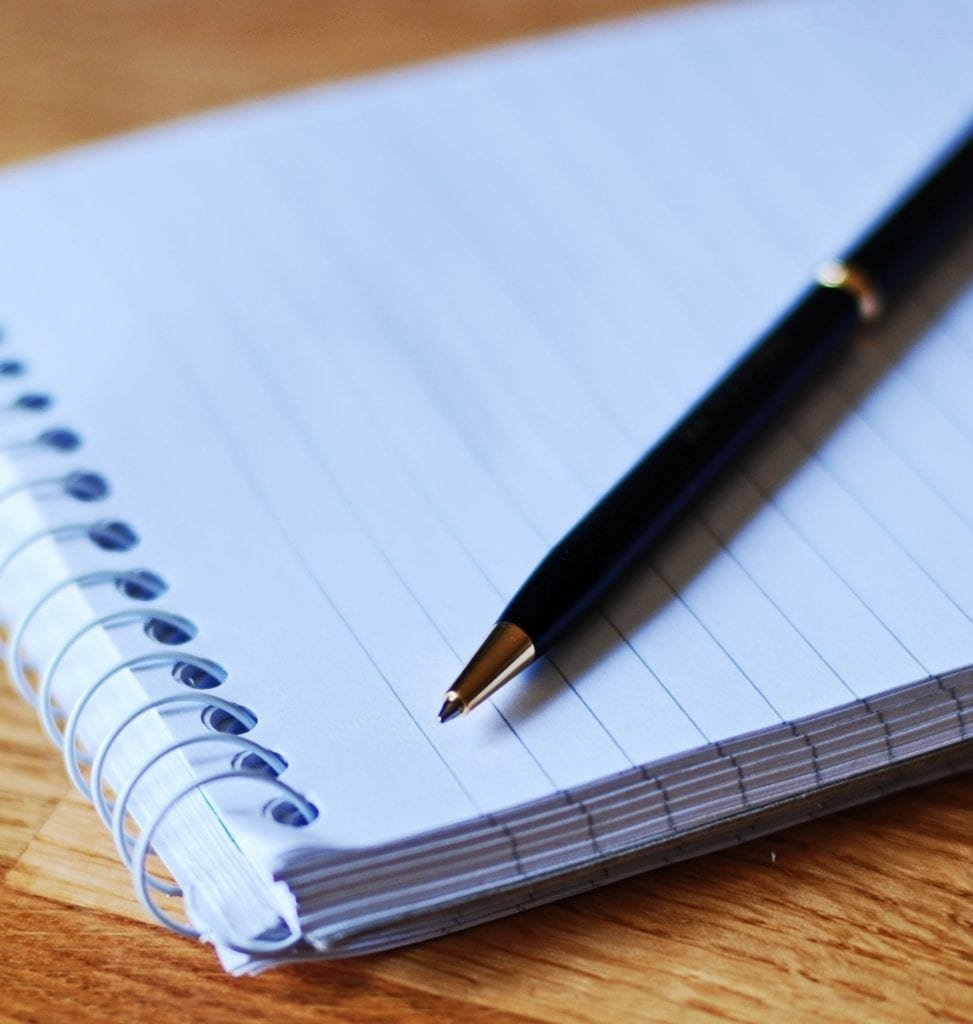 Блокнот с ручкой