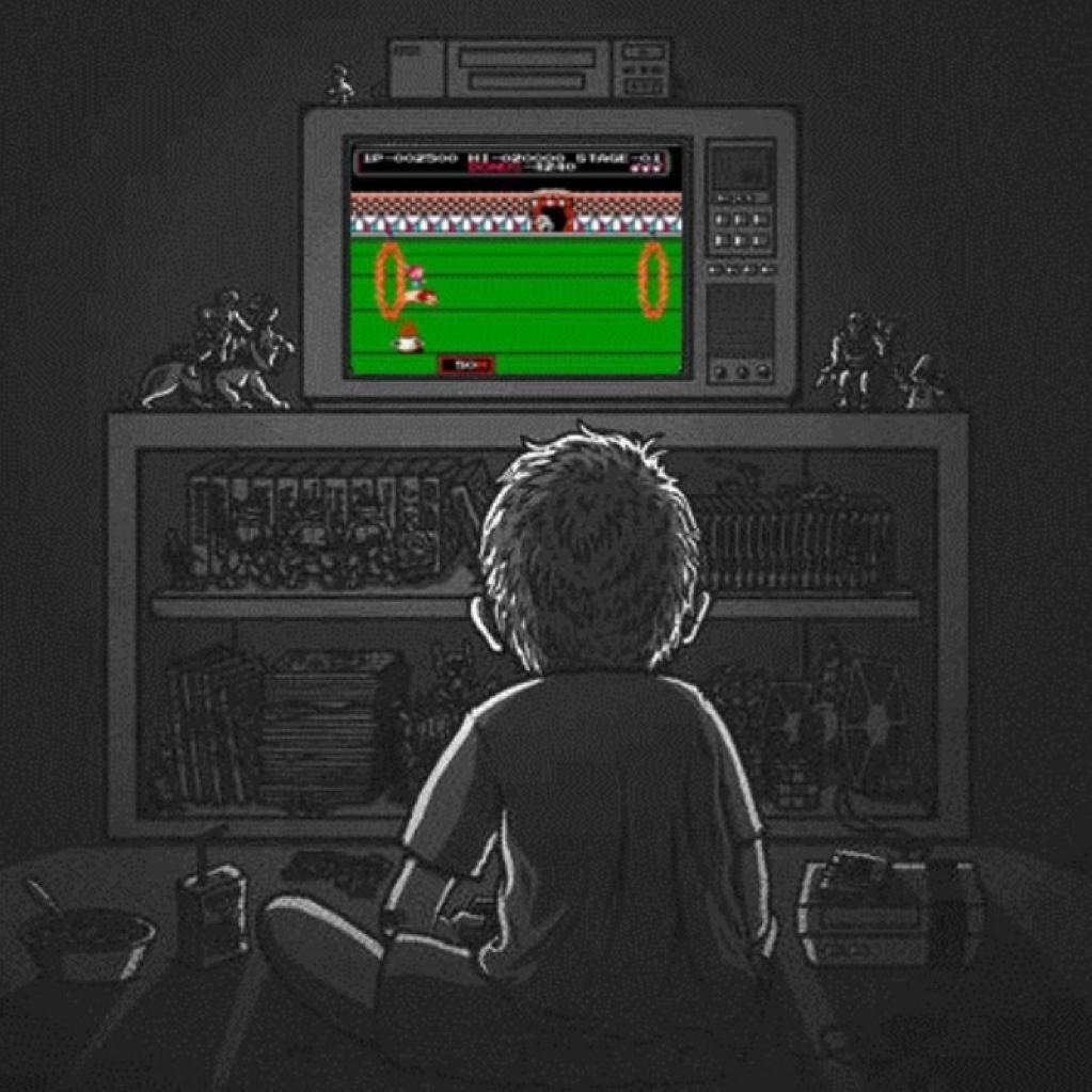 Парень играет в Денди