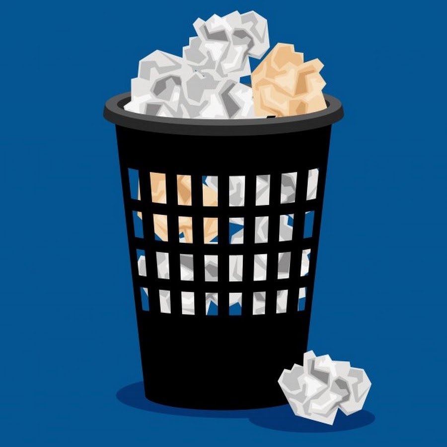 Смятая бумага и мусорная корзина