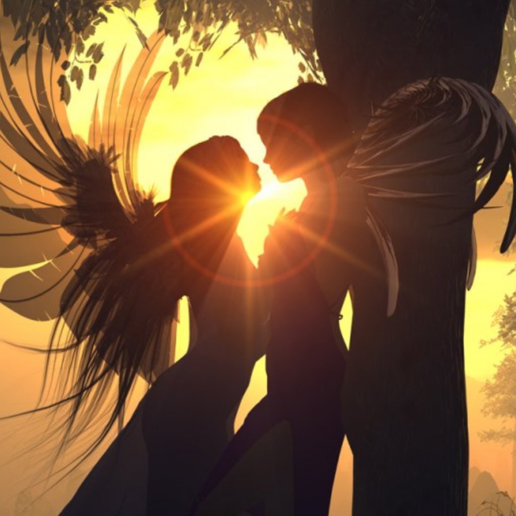 Ангел обнимает крыльями