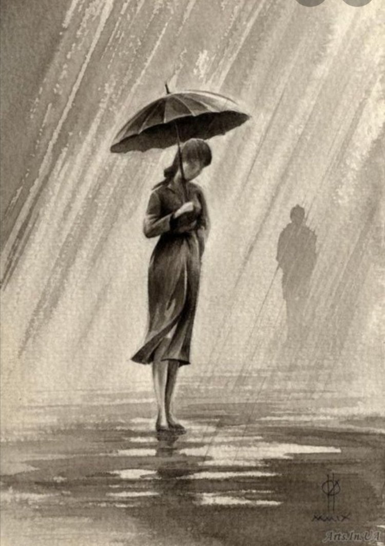 Человек с зонтом под дождем