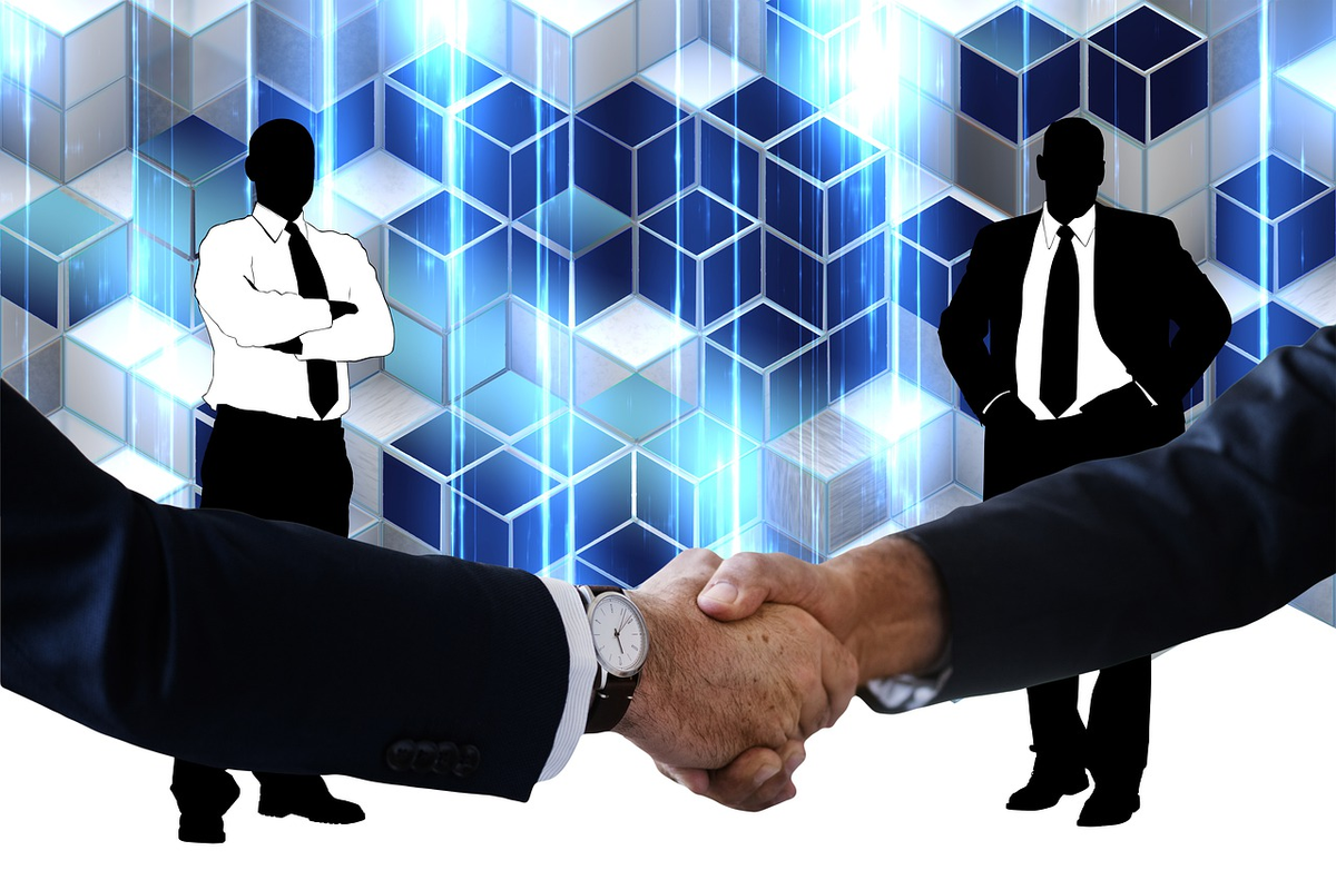 Рукопожатие деловых людей