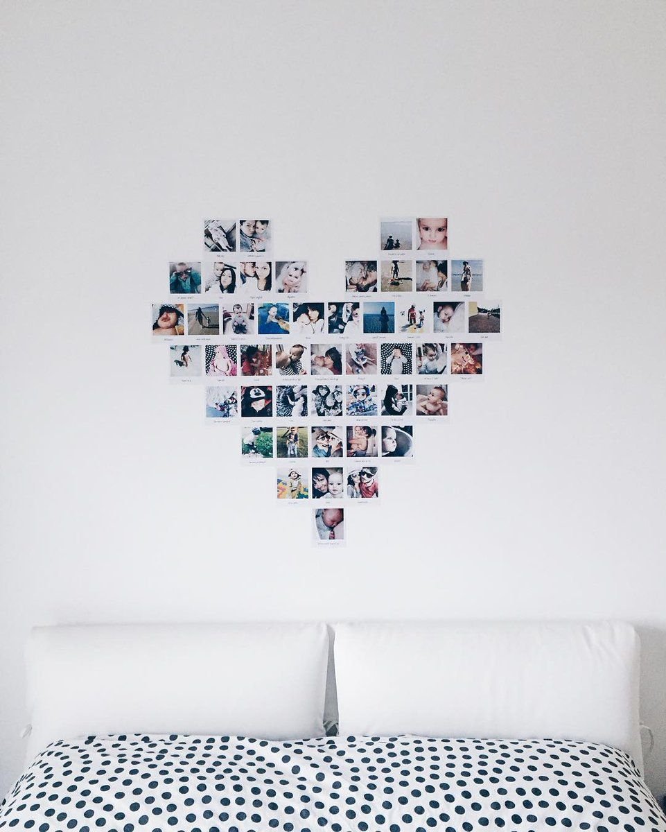 Сердце из фотографий на стене