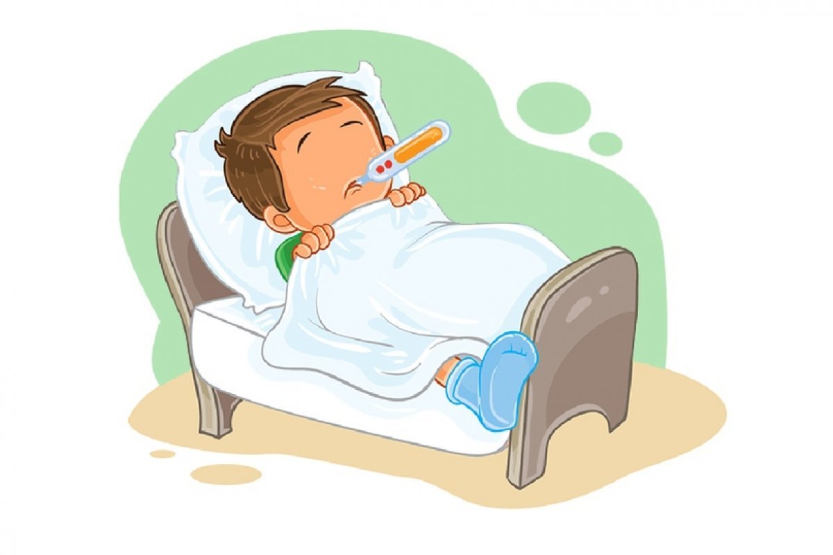 Больной мальчик лежит в кровати