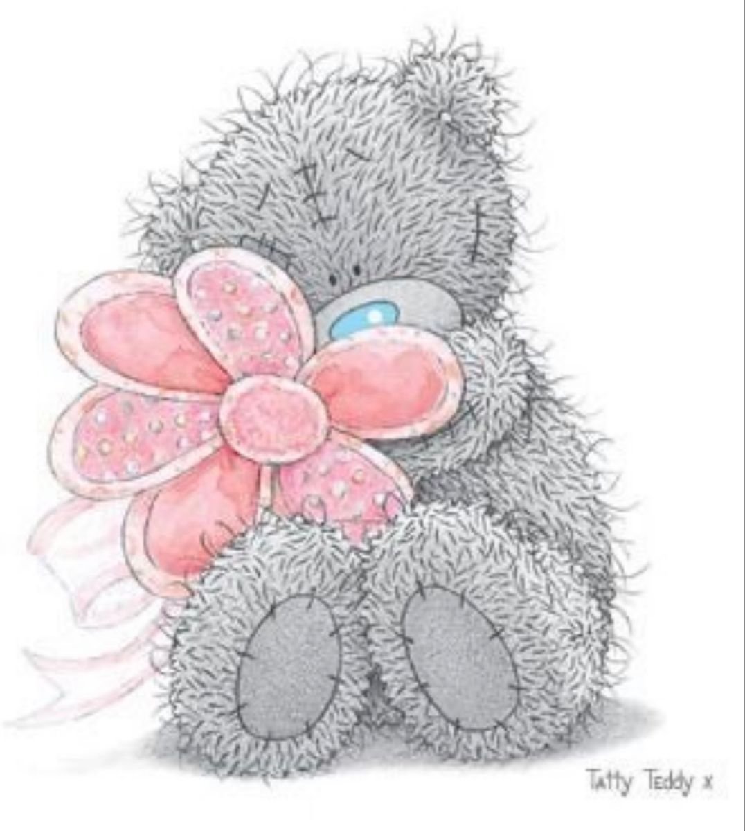 Мишка Тедди с цветочком
