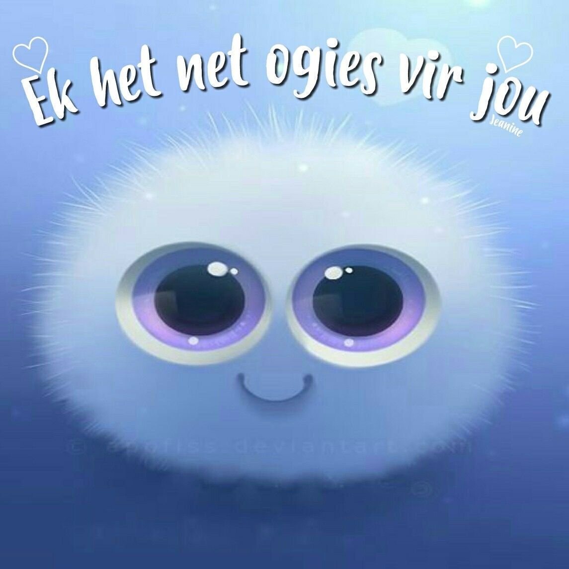 Пушистый шарик с глазками