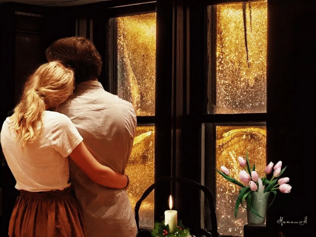 Мужчина и женщина у окна