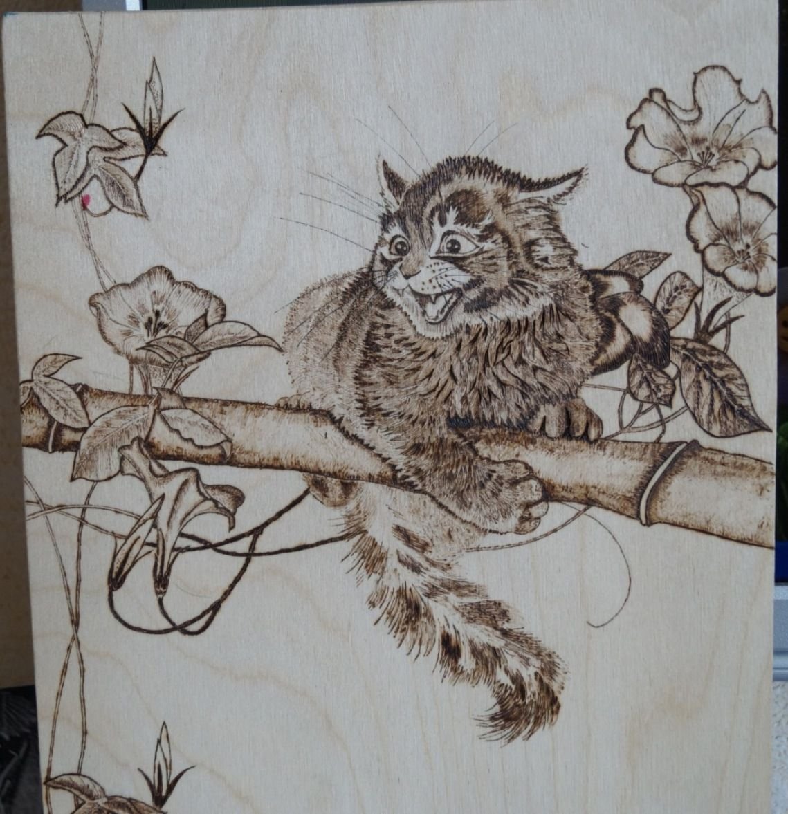 Выжигаем кот на дереве