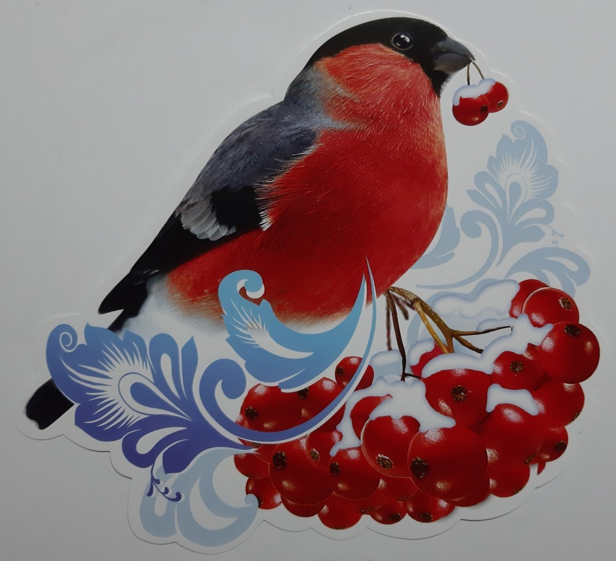 Снегирь на ветке рябины