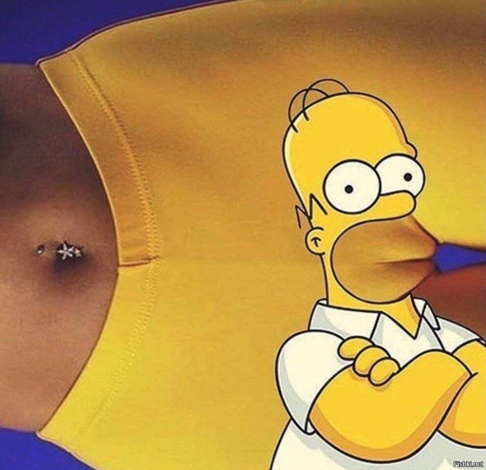 Симпсон лежит на диване