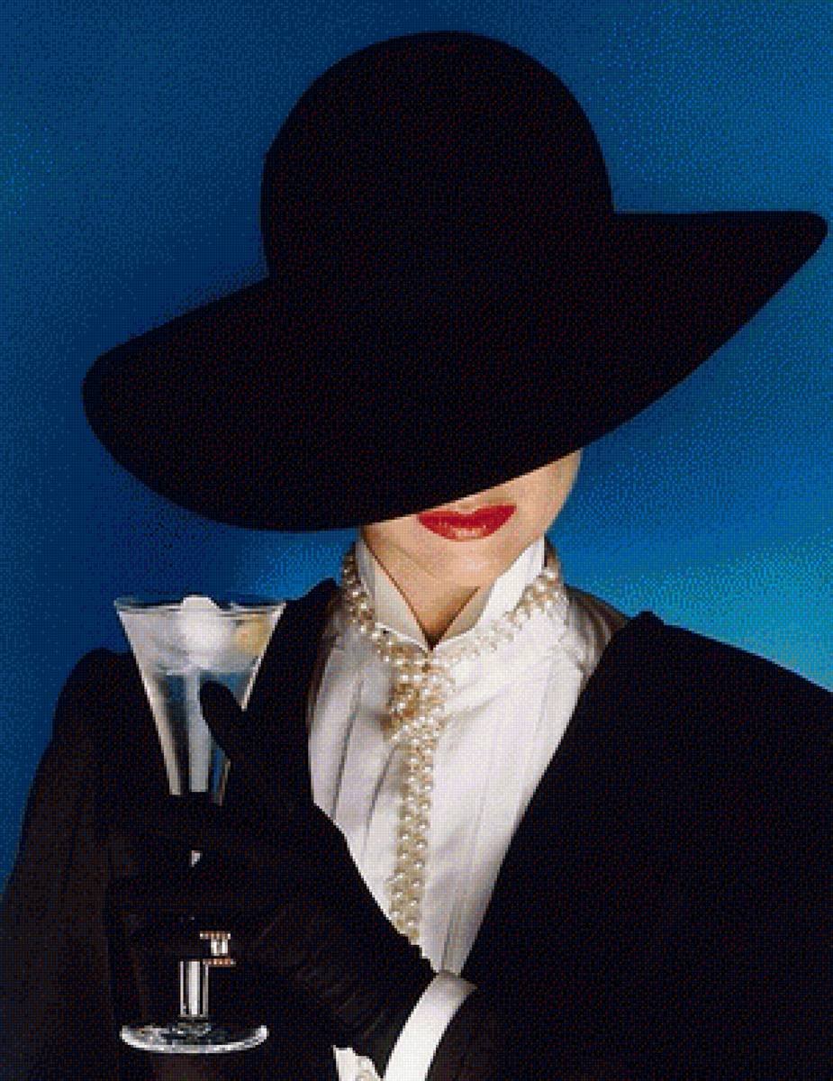 Задумчивая женщина в шляпе