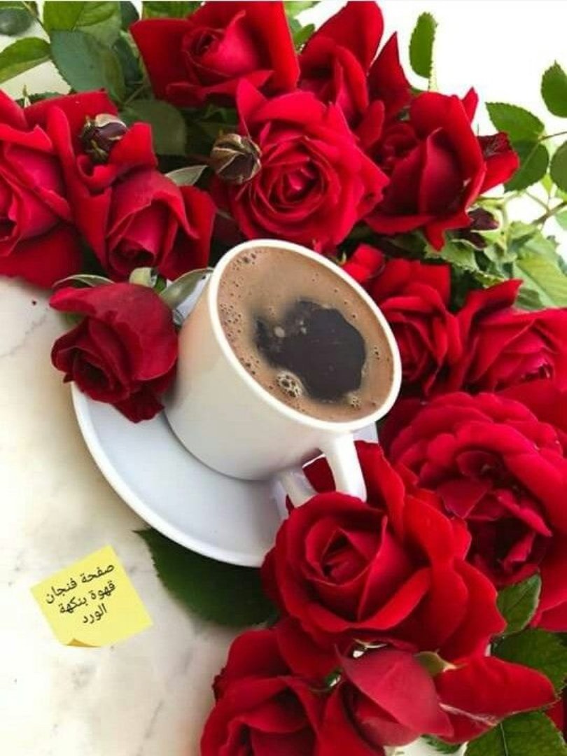 Чашка кофе и роза