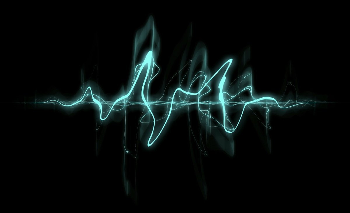 Звуковые волны на темном фоне