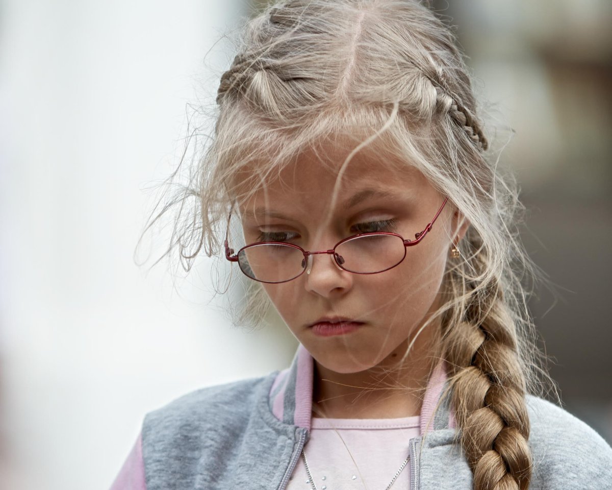 Девочка с косичками