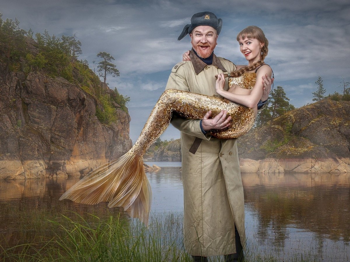 Рыбак с русалкой на руках