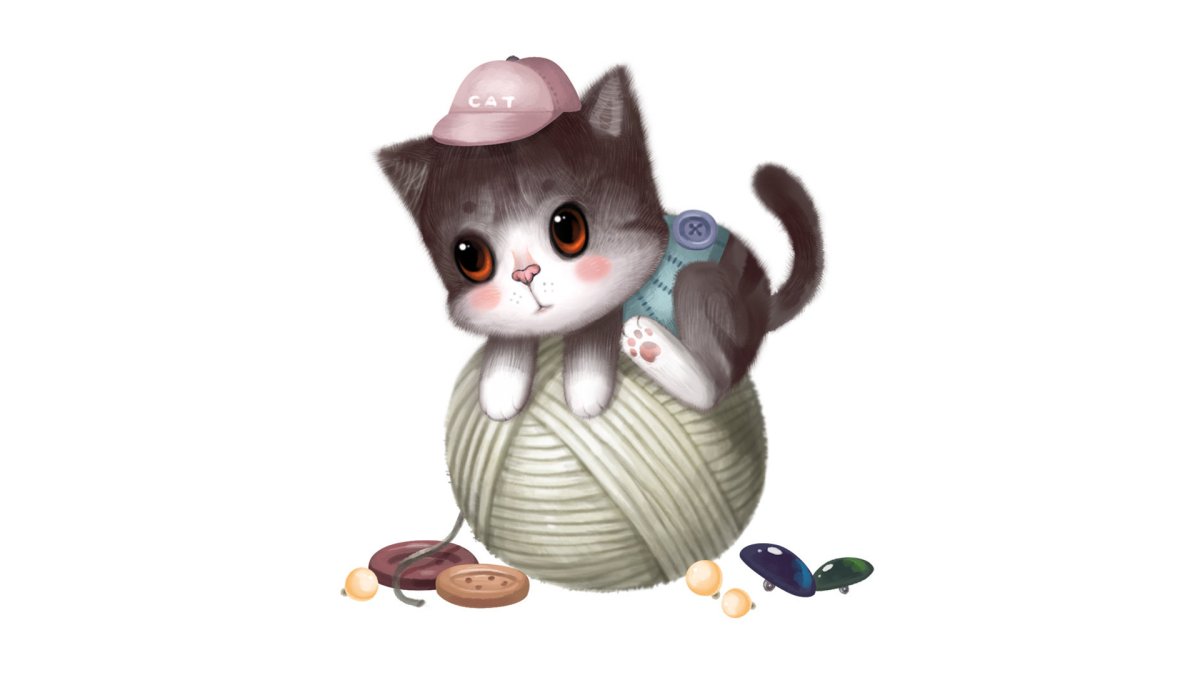 Котенок играющий с клубком