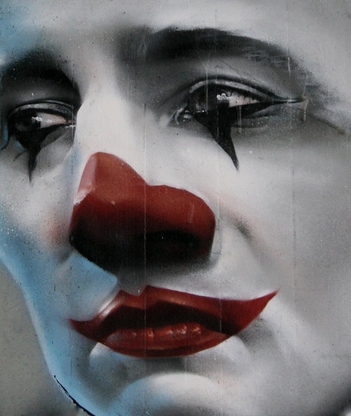 Грустный клоун Смайл