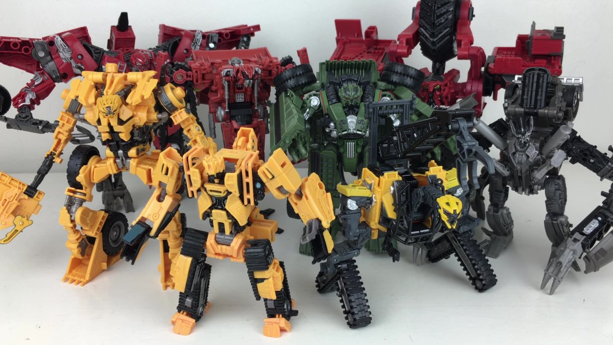 Трансформеры конструктиконы игрушки студио Сериес