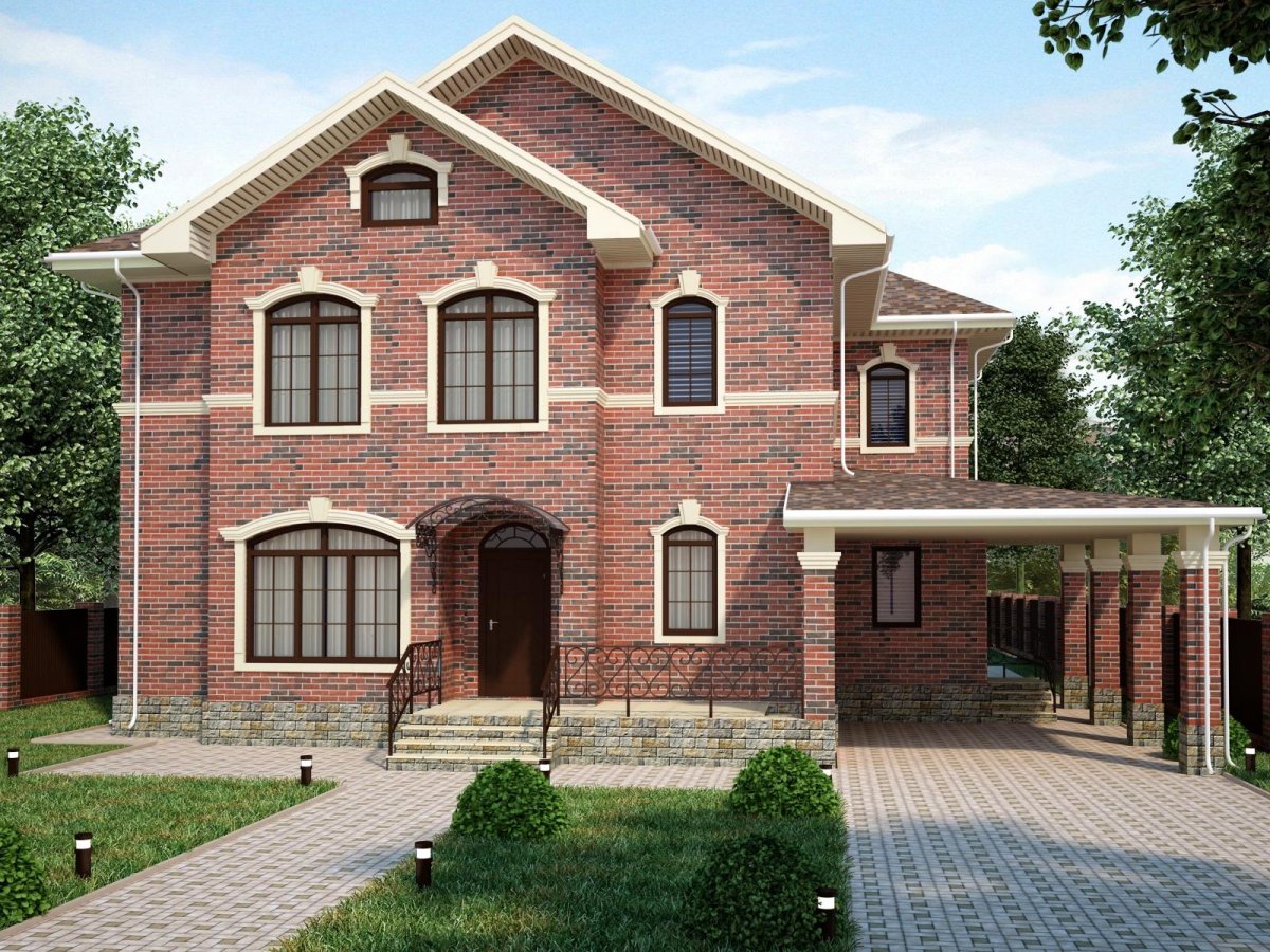 Красивый двухэтажный кирпичный дом