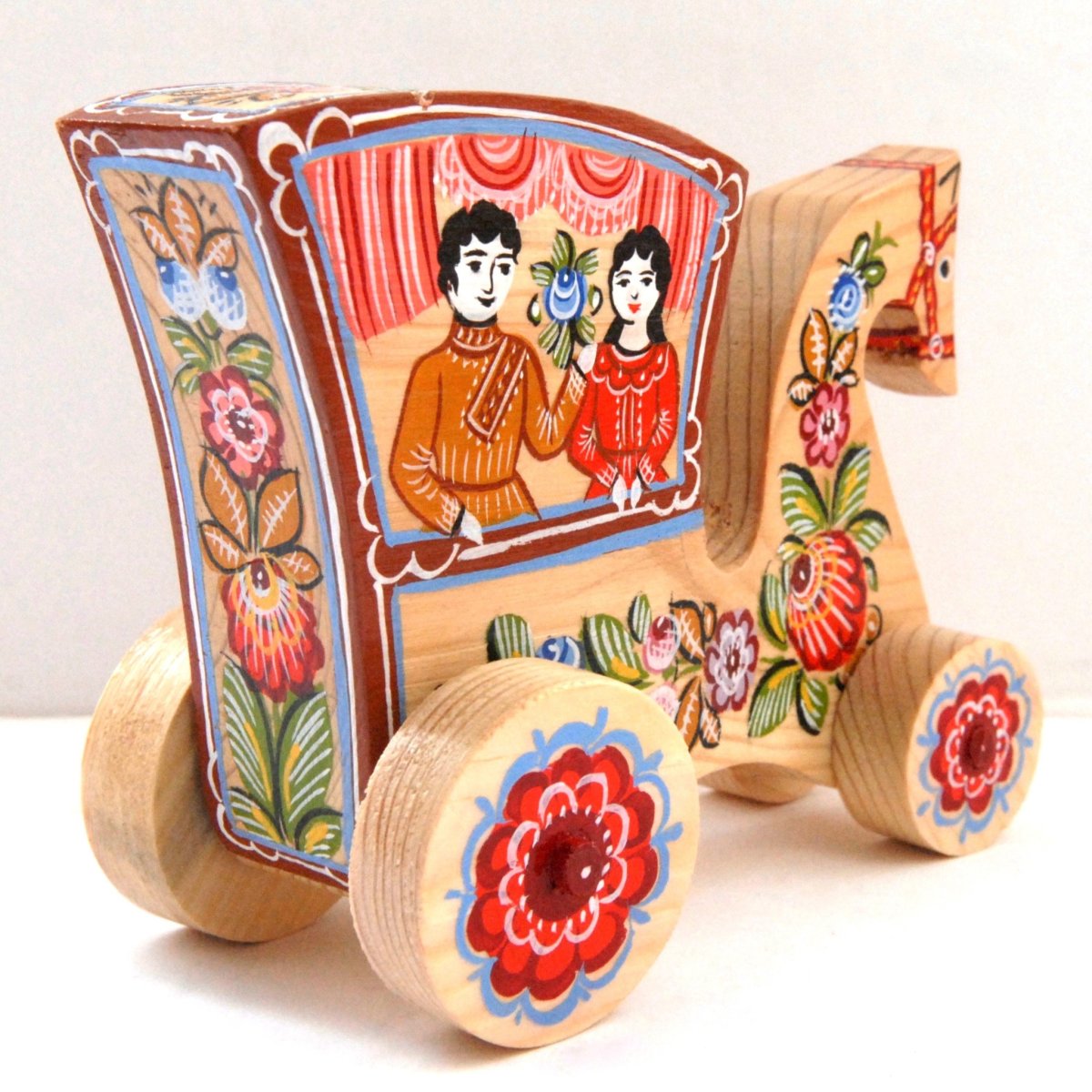 Роспись глиняных игрушек Дымково