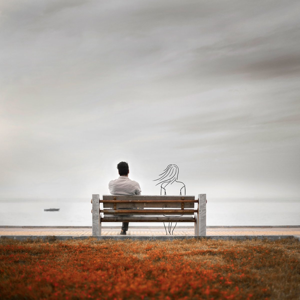 Одинокий парень сидит