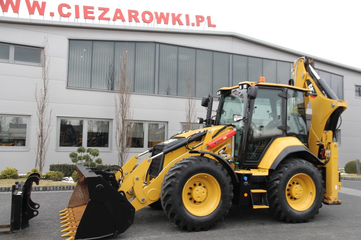 Погрузчик – экскаватор Caterpillar 444f