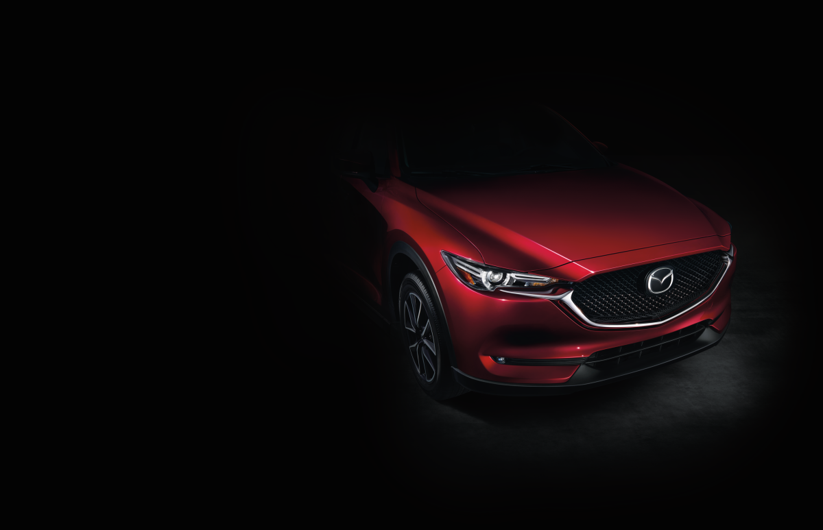 Мазда на темном фоне