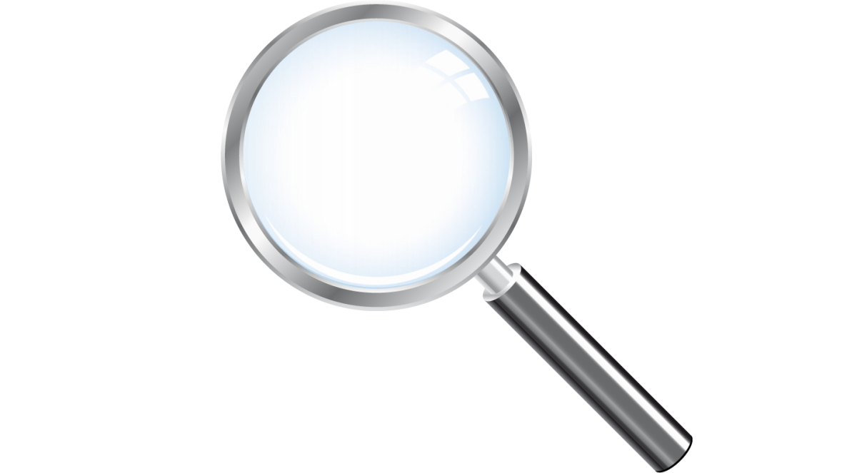 Лупа в руках человека