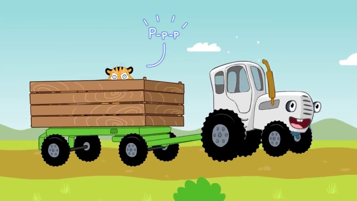 Синий трактор спереди с телегой на белом