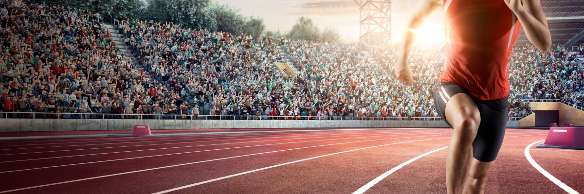 Бег спортсмен на стадионе