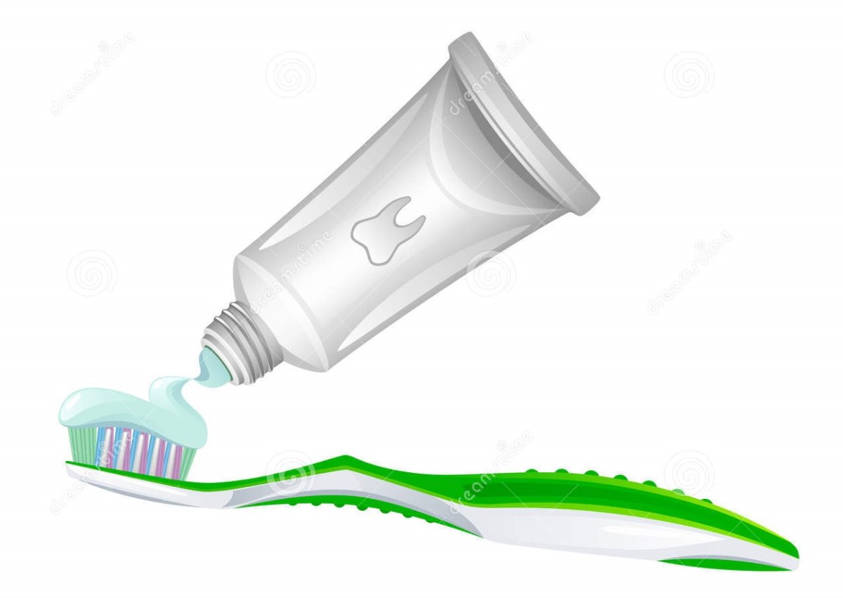 Зубная паста и щетка на белом фоне