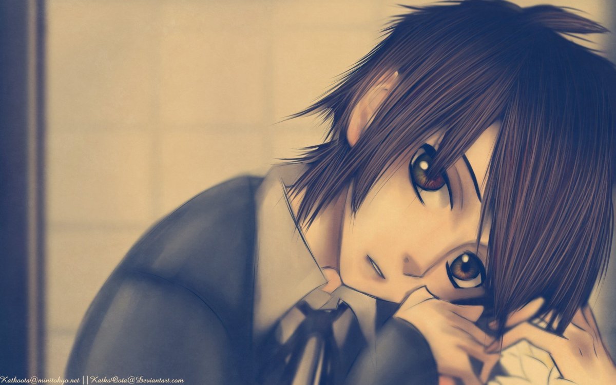 Парень с чёрными волосами и красными глазами