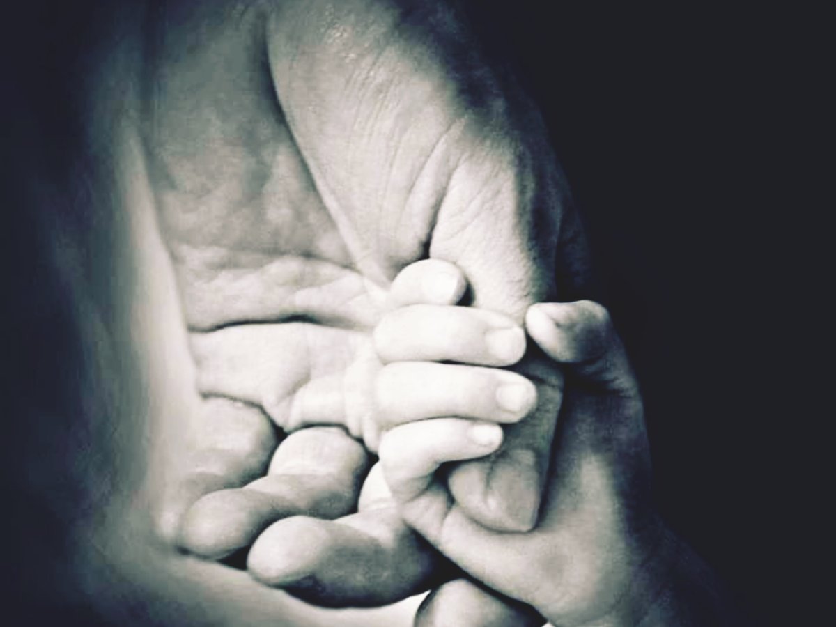 Рука отца и сына