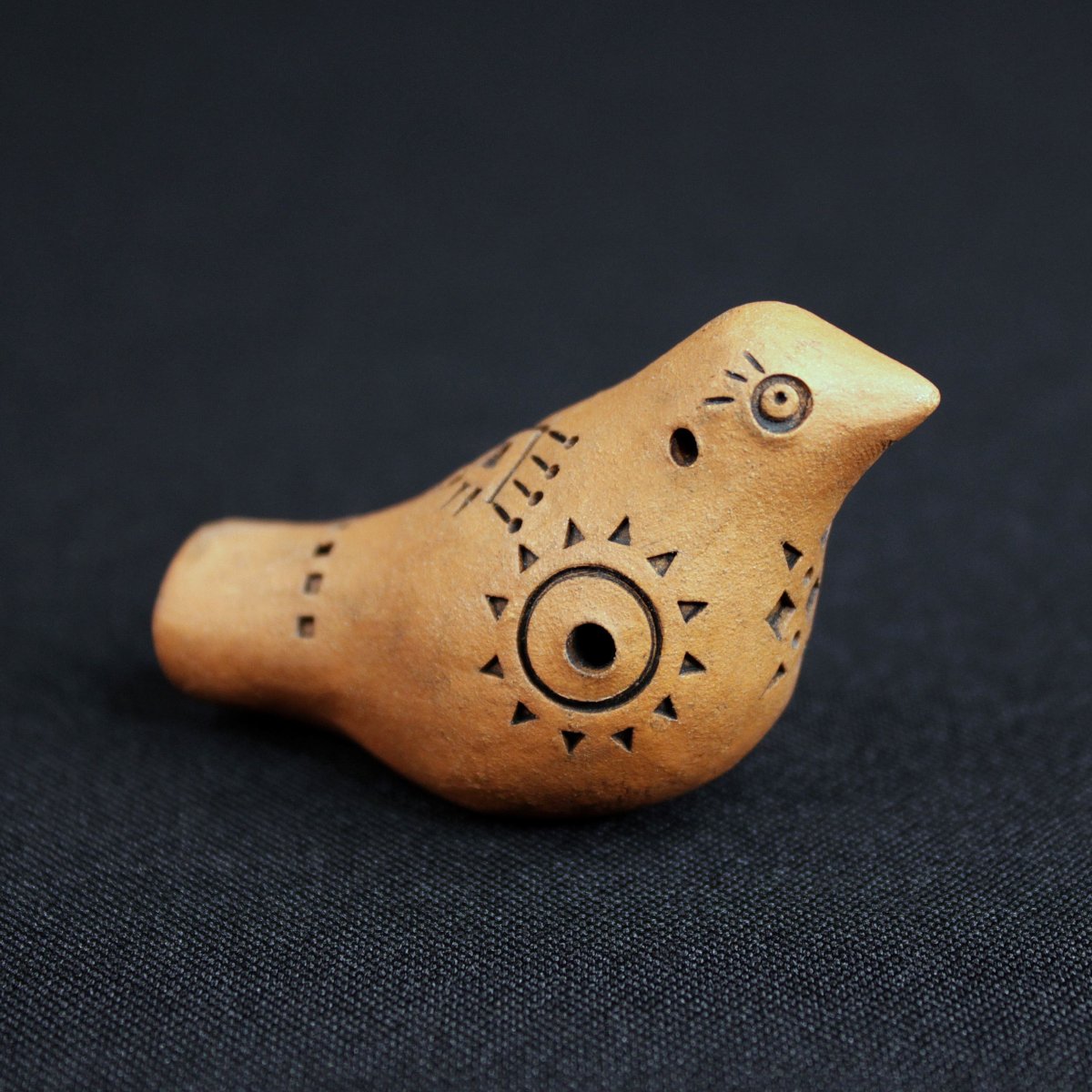 Глиняная свистулька уточка