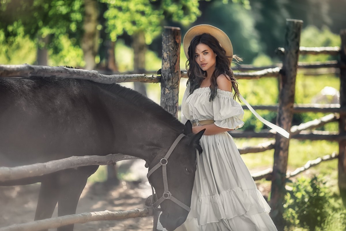 Дама в шляпе на лошади