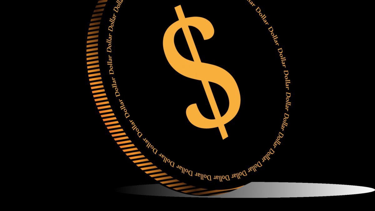 Знак доллара на темном фоне