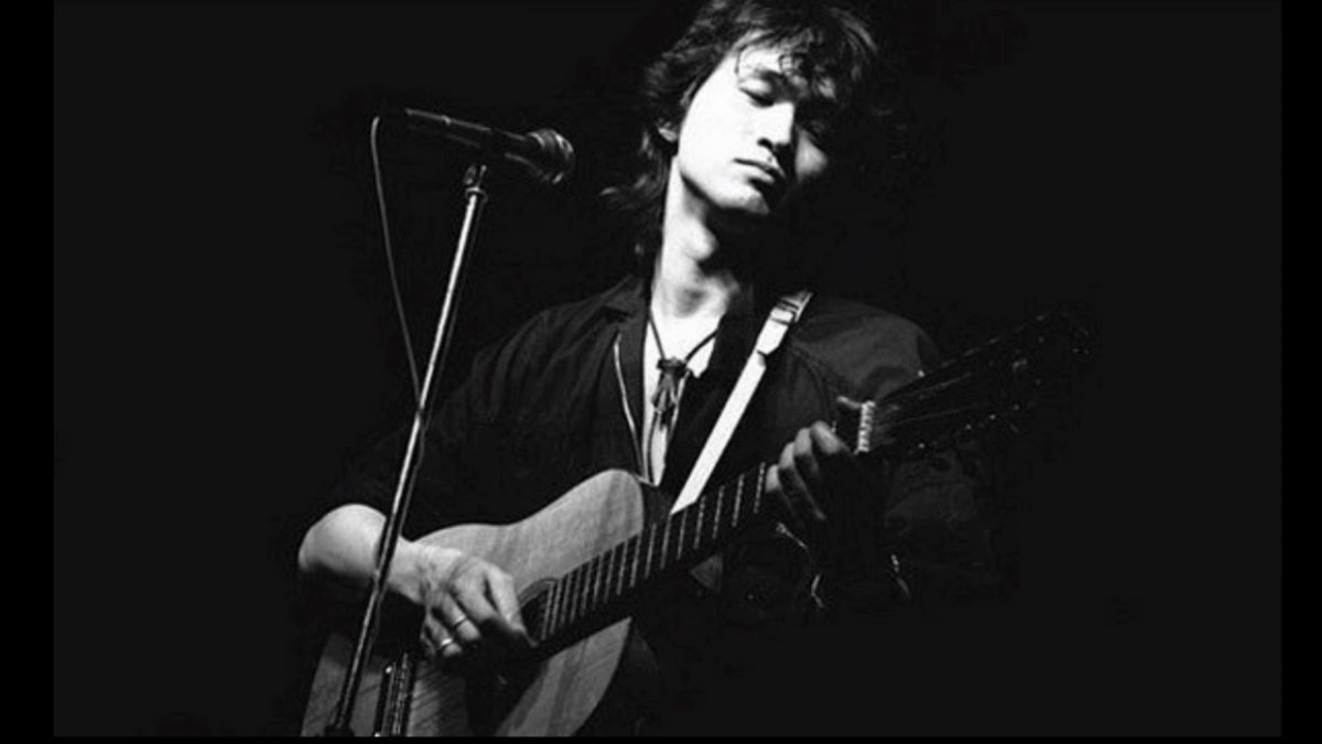 Виктор Цой с гитарой