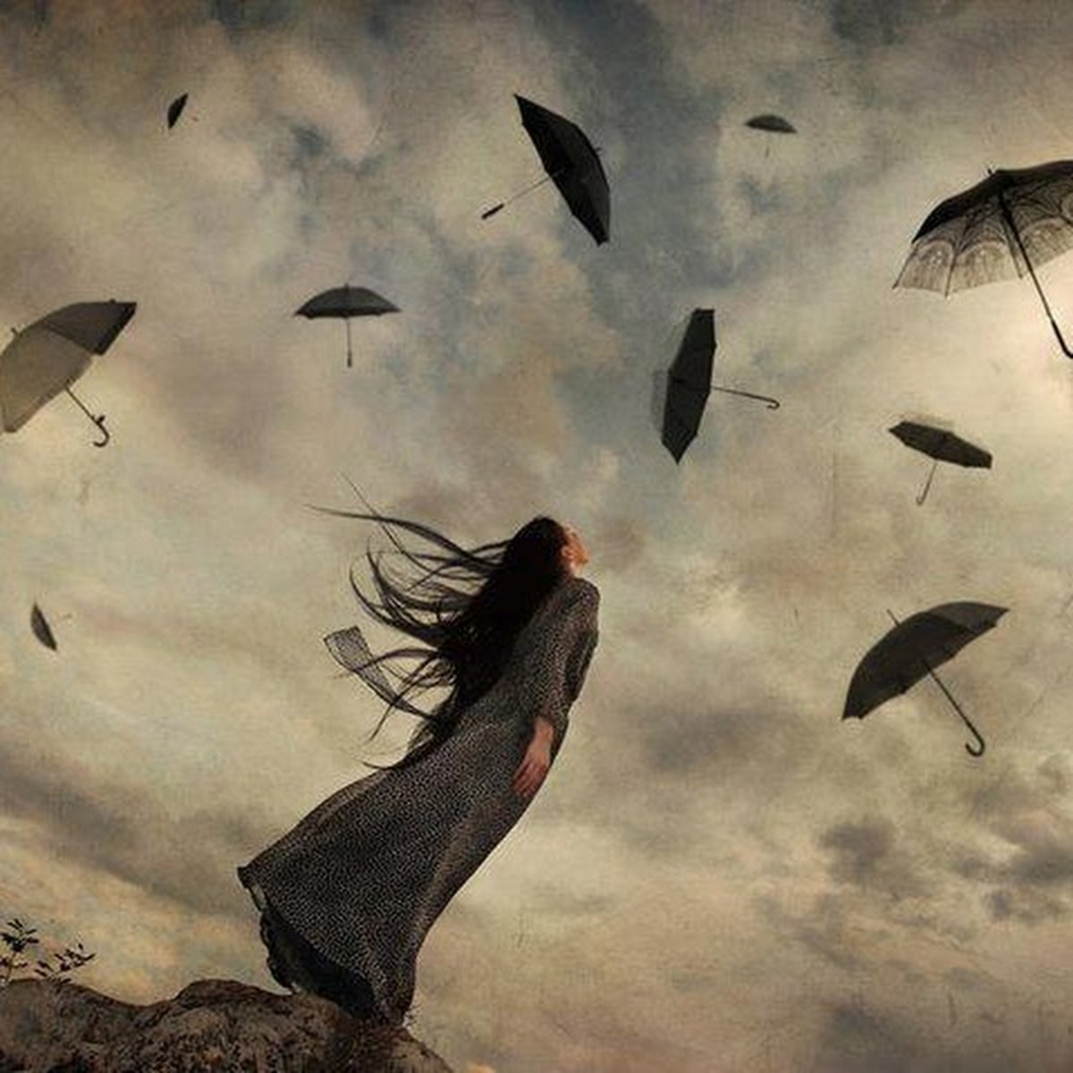 Уносит с зонтиком