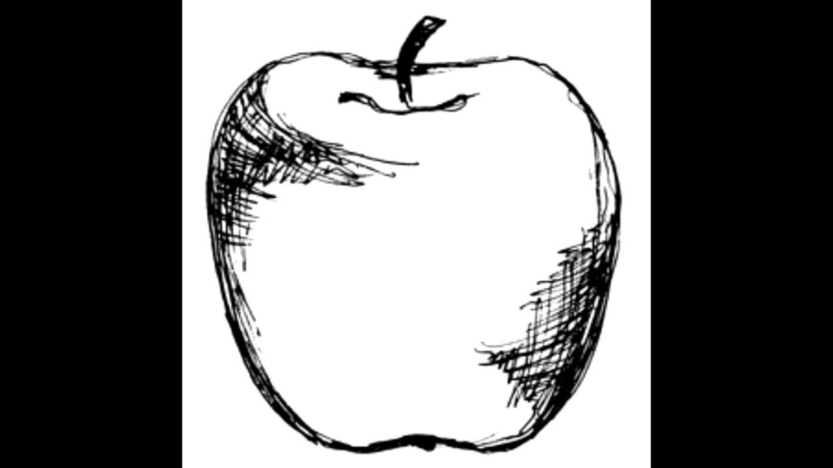 Белое яблоко на черном фоне