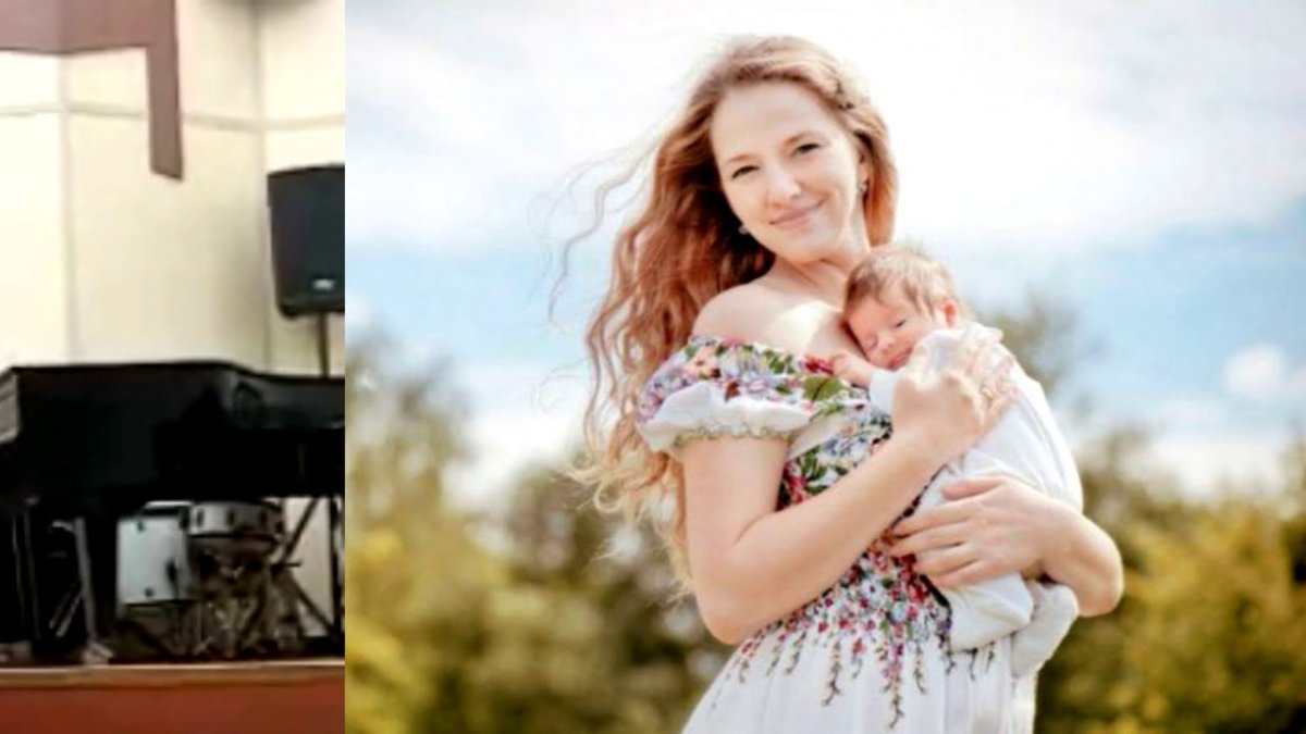 Женщина с ребенком на руках