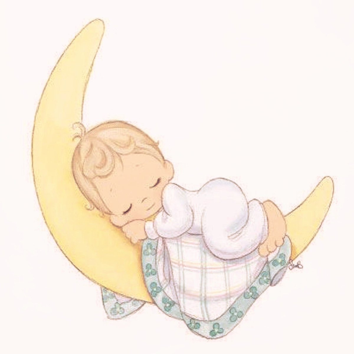 Малыш спит в колыбельке