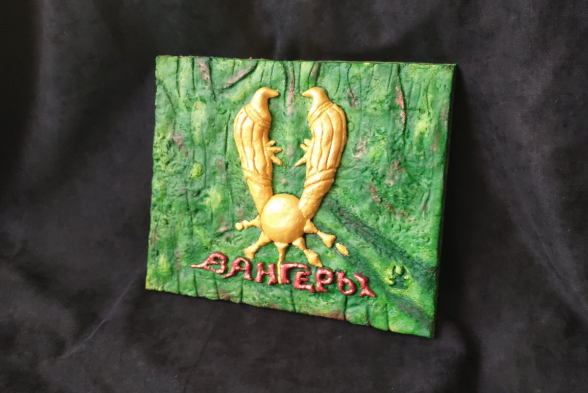 Вангеры эмблема