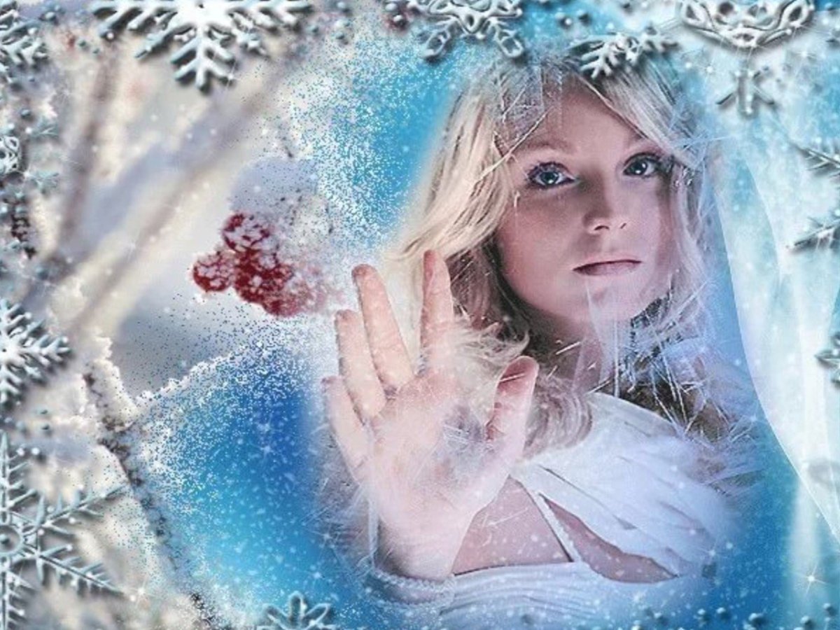 Падают снежинки на девушку