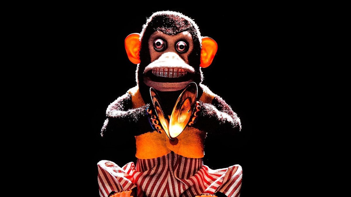 Смешная обезьяна с бананом