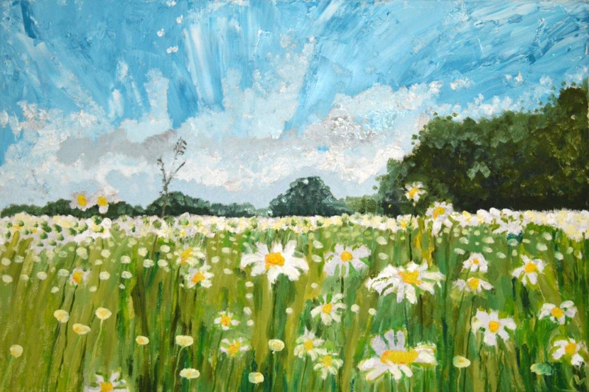 Дети в поле с ромашками