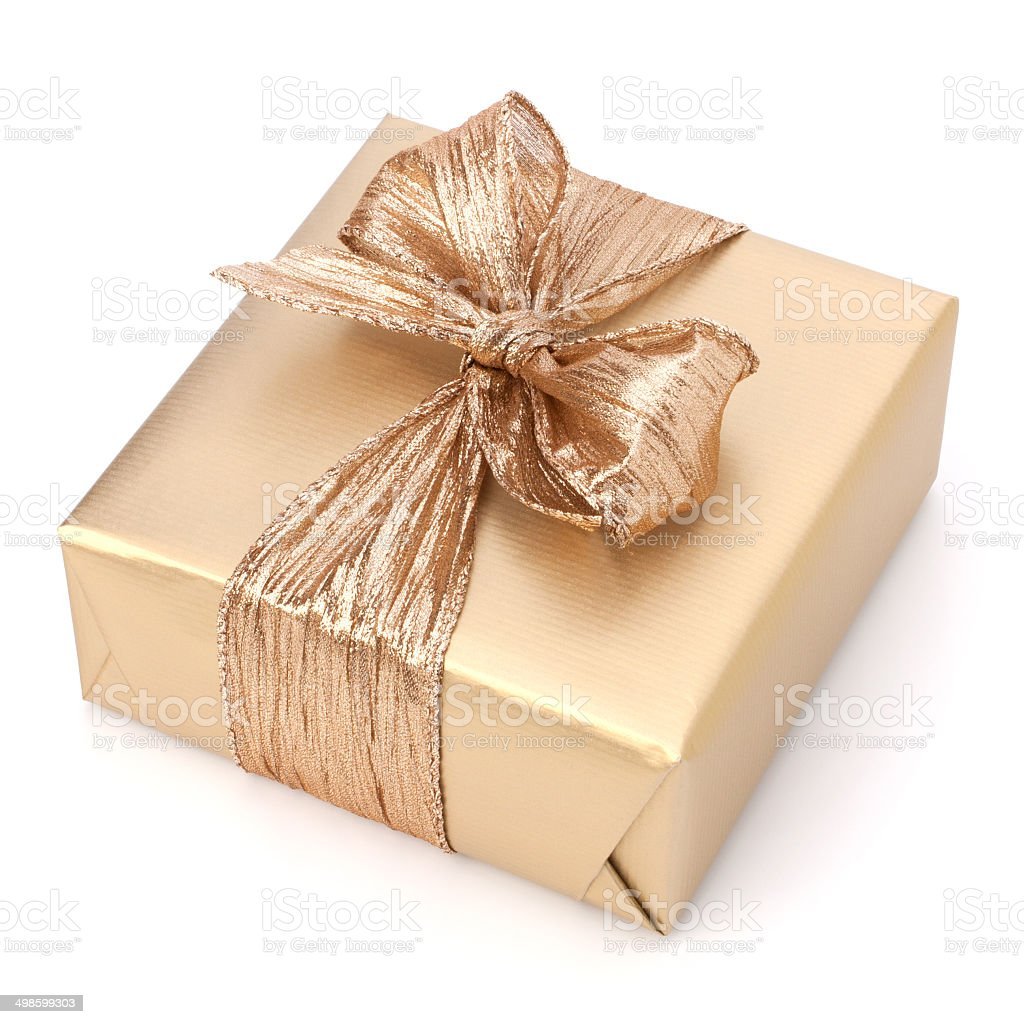 Белый подарок на бежевом фоне