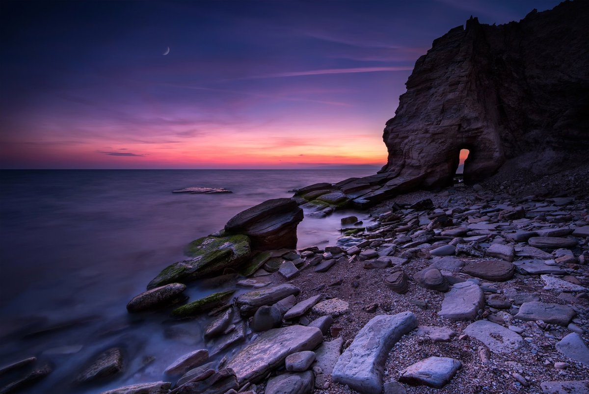 Море скалы закат